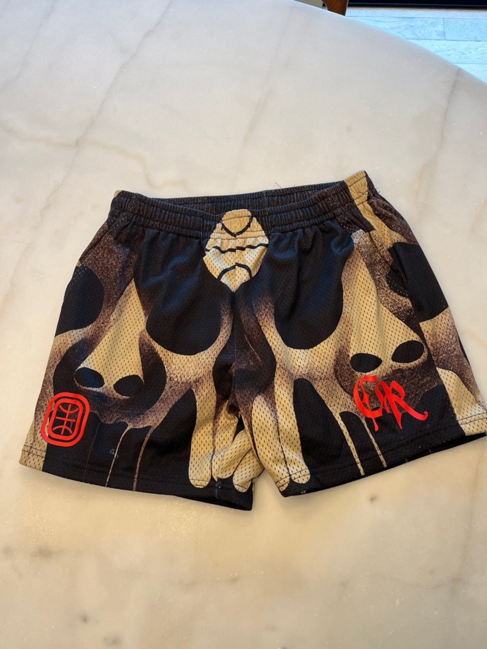 Men's Athletic Mesh Shorts in Black and Tan with Graphic Detail
